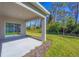 Covered patio with view of backyard at 2179 W Price Blvd, North Port, FL 34286