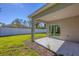 Covered patio overlooking backyard at 2179 W Price Blvd, North Port, FL 34286