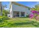 Spacious covered patio with outdoor furniture at 2586 Prospect St, Sarasota, FL 34239