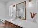 Elegant bathroom with a vanity and large mirror at 2586 Prospect St, Sarasota, FL 34239
