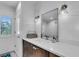 Simple bathroom with a vanity and mirror at 2586 Prospect St, Sarasota, FL 34239