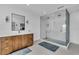 Modern bathroom with a large walk-in shower and double vanity at 2586 Prospect St, Sarasota, FL 34239
