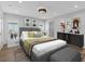 Cozy bedroom with neutral colors, a comfortable bed, and stylish decor at 2586 Prospect St, Sarasota, FL 34239