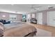 Luxurious main bedroom suite with sitting area and hardwood floors at 2586 Prospect St, Sarasota, FL 34239