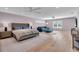 Large main bedroom with sitting area, hardwood floors and plenty of natural light at 2586 Prospect St, Sarasota, FL 34239