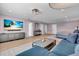 Spacious main bedroom with sitting area and large TV at 2586 Prospect St, Sarasota, FL 34239