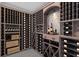 Spacious wine cellar with custom racking for hundreds of bottles, and decorative display area at 2586 Prospect St, Sarasota, FL 34239