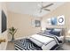 Bright bedroom with a queen-size bed and nautical-themed decor at 2917 Park Lake Dr # 2917, Bradenton, FL 34209