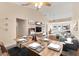 Light-filled dining area with a wood table and modern chairs at 2917 Park Lake Dr # 2917, Bradenton, FL 34209