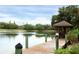 Wooden dock extending over calm lake waters at 2917 Park Lake Dr # 2917, Bradenton, FL 34209