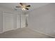 Bedroom with double door closet and ceiling fan at 3614 E 62Nd Ave, Bradenton, FL 34203