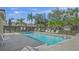 Relaxing community pool area with lounge chairs and a pool house at 3614 E 62Nd Ave, Bradenton, FL 34203