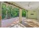 Relaxing Florida room with sliding glass doors opening to a brick patio at 3614 E 62Nd Ave, Bradenton, FL 34203