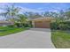 Charming single-story home with a well-manicured lawn, beautiful landscaping and a large driveway at 3614 E 62Nd Ave, Bradenton, FL 34203