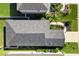 Top-down view of a house showing the gray roof and driveway at 3632 Shimmering Oaks Dr, Parrish, FL 34219