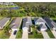 Aerial view of a residential neighborhood with houses and green spaces at 3632 Shimmering Oaks Dr, Parrish, FL 34219