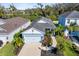 Aerial view of charming home with landscaping at 3632 Shimmering Oaks Dr, Parrish, FL 34219