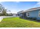 Private backyard with a fenced perimeter and green lawn at 3632 Shimmering Oaks Dr, Parrish, FL 34219
