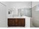 Double vanity bathroom with a large walk-in shower at 3632 Shimmering Oaks Dr, Parrish, FL 34219