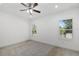 Bright bedroom with neutral carpeting and ceiling fan at 3632 Shimmering Oaks Dr, Parrish, FL 34219
