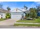 Exterior of charming light blue home at 3632 Shimmering Oaks Dr, Parrish, FL 34219