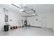 Garage with overhead storage and work bench at 3632 Shimmering Oaks Dr, Parrish, FL 34219