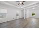 Open living room featuring tile floors and neutral walls at 3632 Shimmering Oaks Dr, Parrish, FL 34219