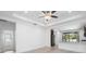 Bright living room with tile floors and ceiling fan at 3632 Shimmering Oaks Dr, Parrish, FL 34219