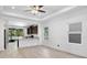 Spacious living room with hardwood floors and ceiling fan at 3632 Shimmering Oaks Dr, Parrish, FL 34219
