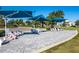 Relaxing patio with shaded seating and brick pavement at 3632 Shimmering Oaks Dr, Parrish, FL 34219