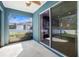 Screened porch with access to the backyard and a view of the house at 3632 Shimmering Oaks Dr, Parrish, FL 34219