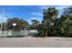 Outdoor basketball court with a hoop and white fence at 4320 47Th W Ave # 203, Bradenton, FL 34210