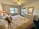 Main bedroom with King bed and dresser, offering comfort and style at 4320 47Th W Ave # 203, Bradenton, FL 34210