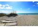 Beachfront with lounge chairs and ocean view at 4545 Gulf Of Mexico Dr # 408, Longboat Key, FL 34228