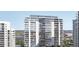 Modern high-rise building with water views and upscale design at 555 Quay Cmn # 705, Sarasota, FL 34236