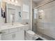 Clean bathroom with single sink vanity and shower/tub combo at 5697 Long Shore Loop, Sarasota, FL 34238