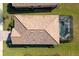 Top-down view of home showcasing tile roof and pool at 6517 Willowshire Way, Bradenton, FL 34212