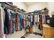 Walk-in closet with ample shelving and hanging space at 6517 Willowshire Way, Bradenton, FL 34212