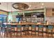 Upscale community bar with comfortable seating and large screens at 6517 Willowshire Way, Bradenton, FL 34212