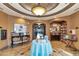 Inviting community library with bookshelves and comfortable seating at 6517 Willowshire Way, Bradenton, FL 34212