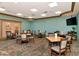 Community room with multiple tables and chairs at 6517 Willowshire Way, Bradenton, FL 34212