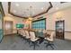 Conference room with large table and chairs at 6517 Willowshire Way, Bradenton, FL 34212