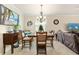 Dining area with ample seating and natural light at 6517 Willowshire Way, Bradenton, FL 34212