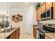 Modern kitchen with stainless steel appliances and a bright, airy feel at 6517 Willowshire Way, Bradenton, FL 34212