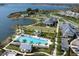 Aerial view of LakeHouse Cove amenities including pool and clubhouse at 764 Tailwind Pl, Sarasota, FL 34240