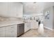 Modern white kitchen with stainless steel appliances at 7840 34Th W Ave # 103, Bradenton, FL 34209