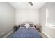 Bright bedroom with a queen-size bed and ensuite bathroom at 7845 Mainsail Ln, Sarasota, FL 34240