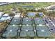 Aerial view of tennis courts and community amenities at 905 Addington Ct # 203, Venice, FL 34293