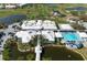 Community clubhouse and pool with golf course views at 905 Addington Ct # 203, Venice, FL 34293