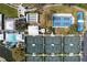 Aerial view of tennis courts, pickleball courts, and pool at 905 Addington Ct # 203, Venice, FL 34293